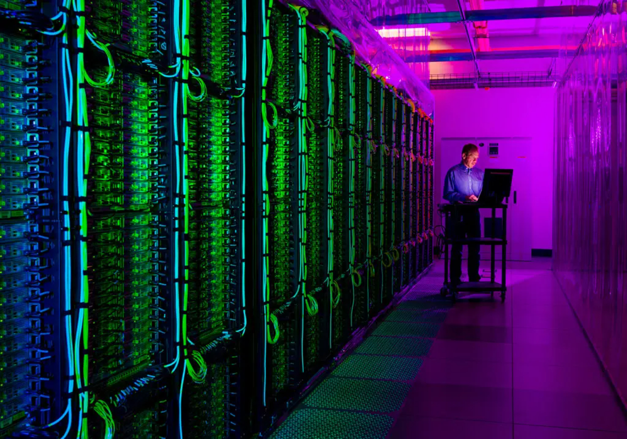 a man working in a data center | Cost Efficient Cloud Storage